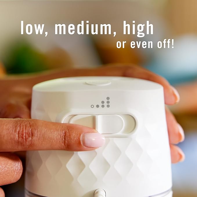 Febreze Plug Scent Booster Starter Kit, Oil Diffuser, Air Freshener Plug in, Continuous Scent Device + 2 Downy Calm Refills